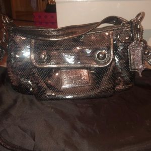 Coach Poppy Handbag. Color is Pewter.